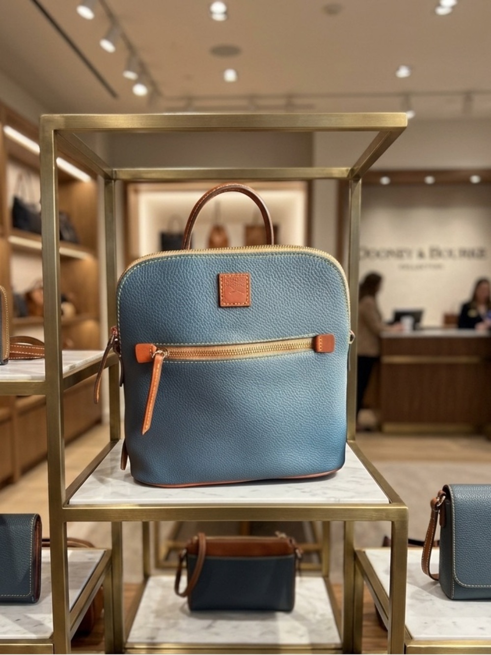 Dooney & Bourke Blue Leather Pebbled Grain Backpack with Tan Trim